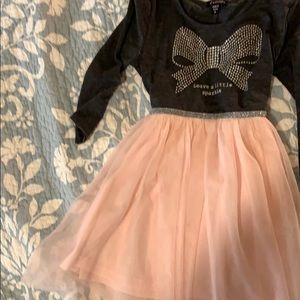 Cute leave a little sparkle dress.